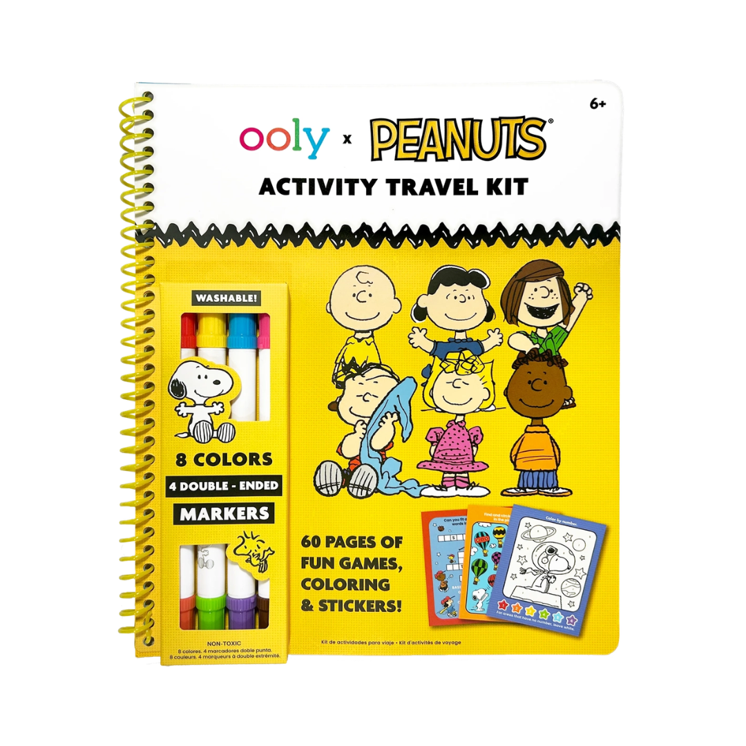 Ooly x Peanuts Activity Travel Kit spiral-bound notebook with a bright yellow cover, cartoon character illustrations, and visible markers on the front, photographed on a white background.
