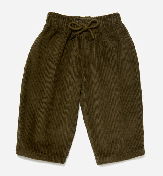 Olive green corduroy organic cotton kids trousers with a tapered leg, an elastic waistband and drawstring, laid flat on a light gray background.